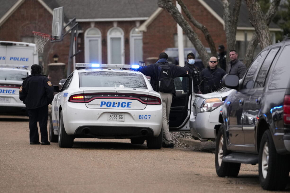 Members of the Memphis Police Department work a crime scene in Memphis, Tenn., Tuesday, Jan. 24, 2023.  Police video of the deadly beating of Tyre Nichols by officers in Memphis, Tenn. is hard to watch. The images are a glaring reminder of repeated failures of efforts to prevent such flashpoints of police brutality.