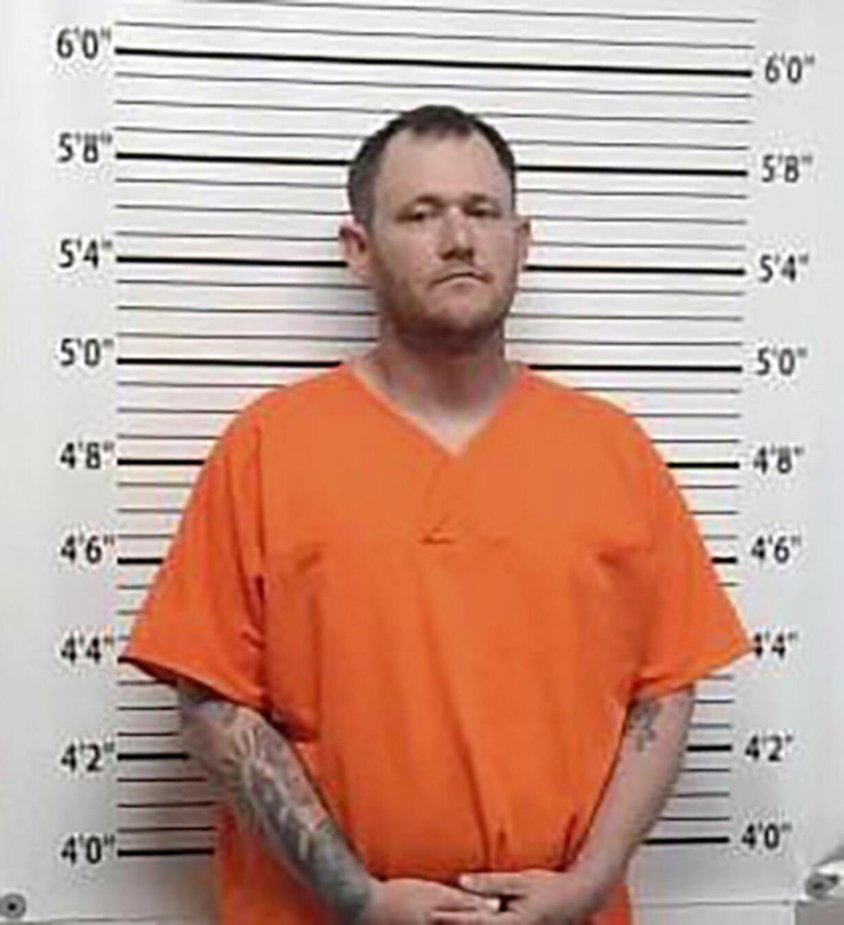 FILE -This photo provided by Caddo County, Oklahoma, Sheriff's Office on Thursday, Jan. 19, 2023 shows Ivon Adams. Ivon Adams, 36, was arrested in Arizona on murder and child neglect charges and returned to Oklahoma. An affidavit for Ivon Adams' arrest alleges he beat 4-year-old Athena Brownfield to death the night of Dec. 25 and later buried her on property he and his wife once owned near the nearby town of Rush Springs, where authorities found the child's body.