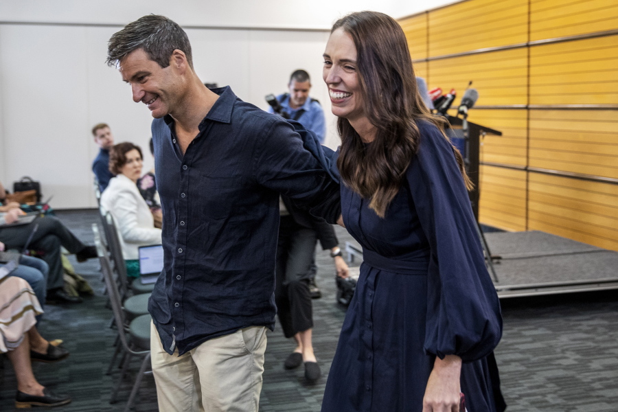 New Zealand Prime Minister Jacinda Ardern, right, with her fiancee Clark Gayford leave a press conference after announcing her resignation in Napier, New Zealand, Thursday, Jan. 19, 2023. Fighting back tears, Ardern told reporters that Feb. 7 will be her last day in office.