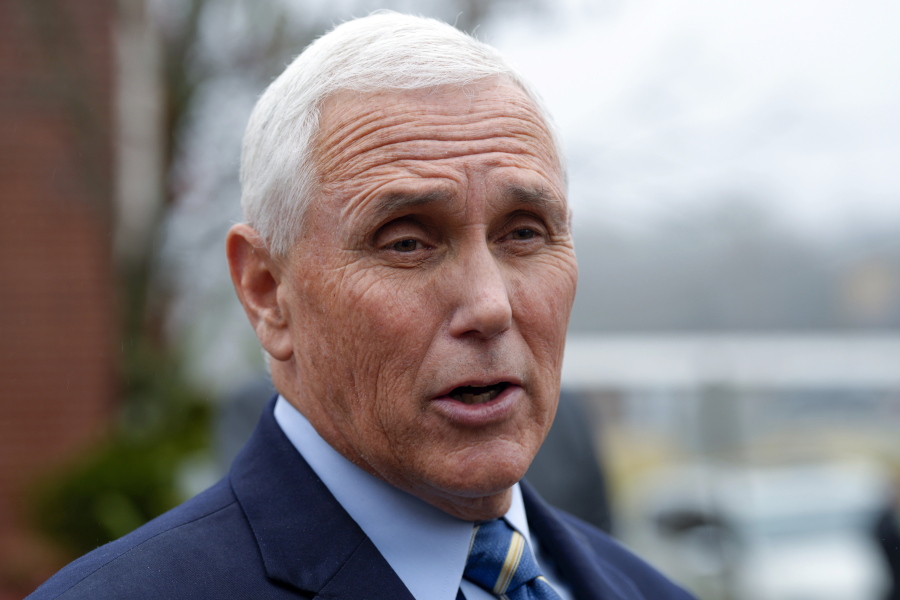 FILE - Former Vice President Mike Pence speaks with reporters, Dec. 6, 2022, at Garden Sanctuary Church of God in Rock Hill, S.C.  Documents with classified markings were discovered in former Vice President Pence's Indiana home last week, according to his attorney.