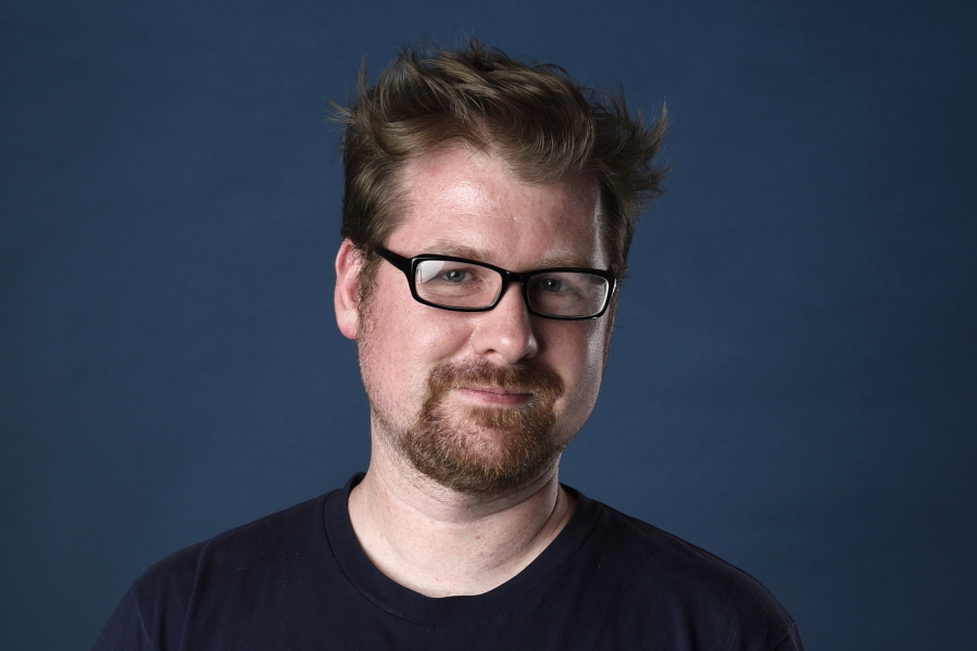 FILE - Justin Roiland poses for a portrait to promote the television series "Rick and Morty" on day two of Comic-Con International, July 21, 2017, in San Diego. Roiland, who created the animated series "Rick and Morty" and provides the voices of the two title characters, is awaiting trial on charges of felony domestic violence against a former girlfriend. A criminal complaint obtained Thursday, Jan. 12, 2023, by The Associated Press from prosecutors in Orange County, Calif., detailed the charges against him.