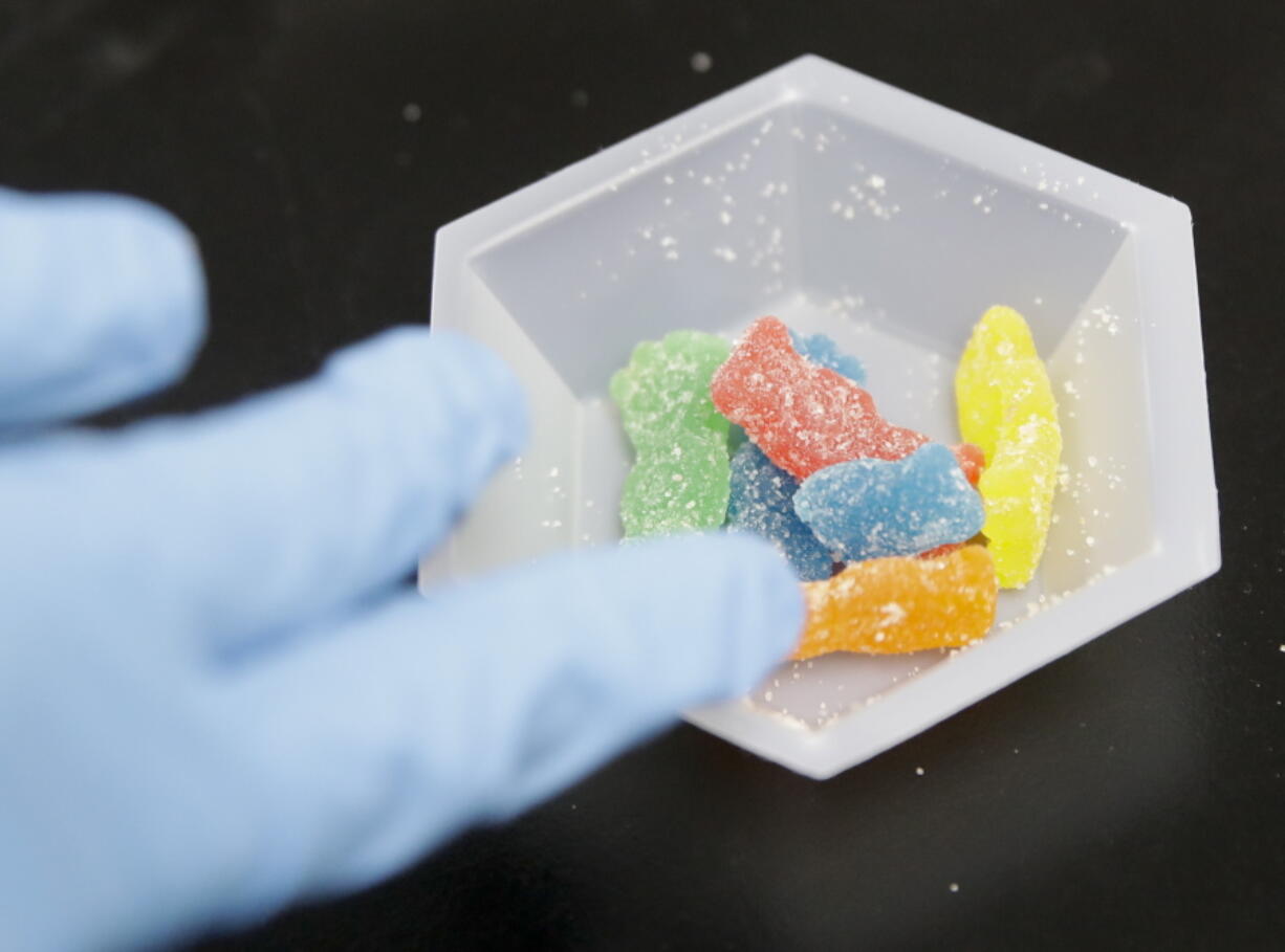 Edible marijuana samples are set aside for evaluation at a cannabis testing laboratory in Santa Ana, Calif., on Wednesday, Aug. 22, 2018. The number of young kids, especially toddlers, who accidentally ate marijuana-laced treats rose sharply over five years as pot became legal in more places in the U.S., according to an analysis published Tuesday, Jan. 3, 2022, in the journal Pediatrics.