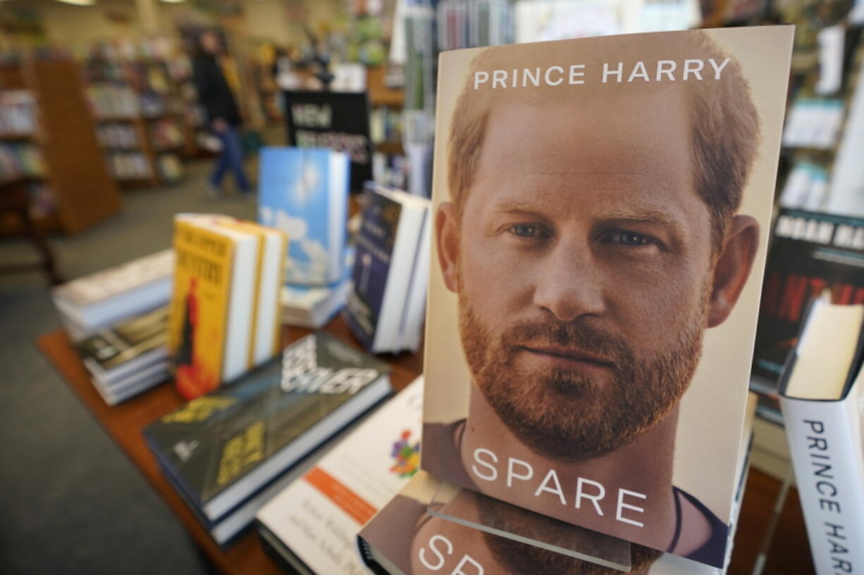 Copies of the new book by Prince Harry called "Spare" are displayed at Sherman's book store in Freeport, Maine, Tuesday, Jan. 10, 2023. Prince Harry's memoir provides a varied portrait of the Duke of Sussex and the royal family. (AP Photo/Robert F.