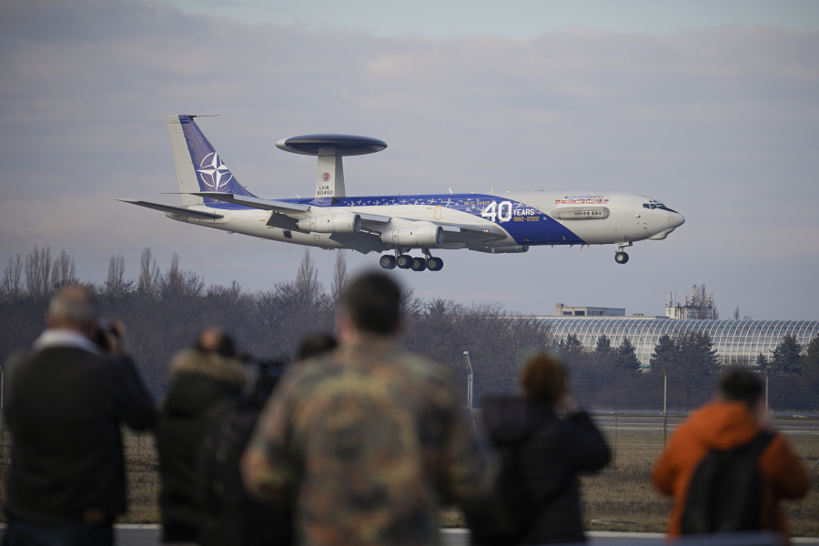 A NATO AWACS aircraft lands at the Baza 90 Romanian air force base in Otopeni, Romania, Tuesday, Jan. 17, 2023. Two of three NATO surveillance planes arrived at an air base near Romania's capital Tuesday where they are set to undertake regional reconnaissance missions to "monitor Russian military activity" within the 30-nation military alliance's territory.