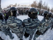 FILE -- Police block a protest against the jailing of opposition leader Alexei Navalny in Yekaterinburg, Russia, Saturday, Jan. 23, 2021. Transparency International's 2022 Corruption Perceptions Index, which measures the perception of public sector corruption according to experts and businesspeople, reported Tuesday that governments hampered by corruption lack the capacity to protect the people, while public discontent is more likely to turn into violence.