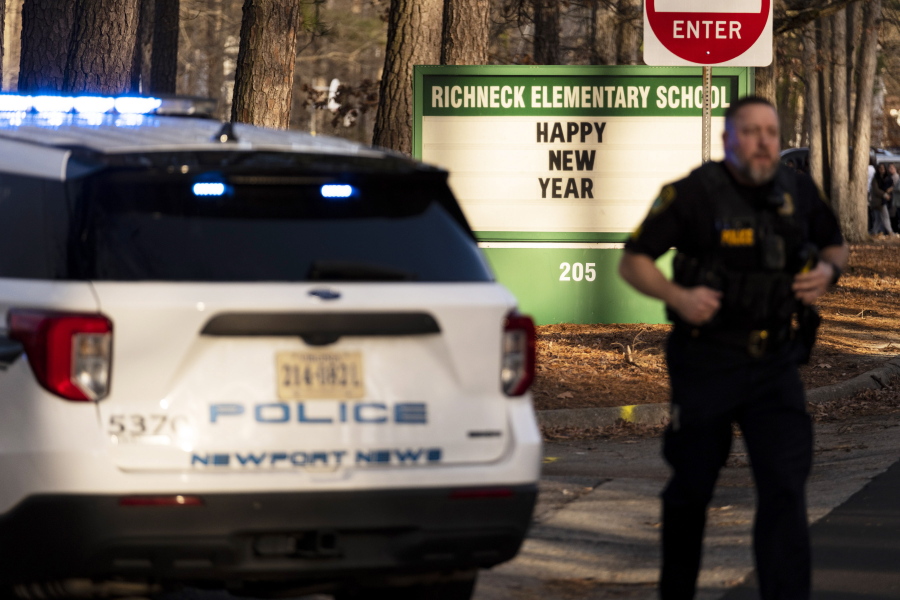 Police respond to a shooting at Richneck Elementary School, Friday, Jan. 6, 2023 in Newport News, Va. A shooting at a Virginia elementary school sent a teacher to the hospital and ended with "an individual" in custody Friday, police and school officials in the city of Newport News said.