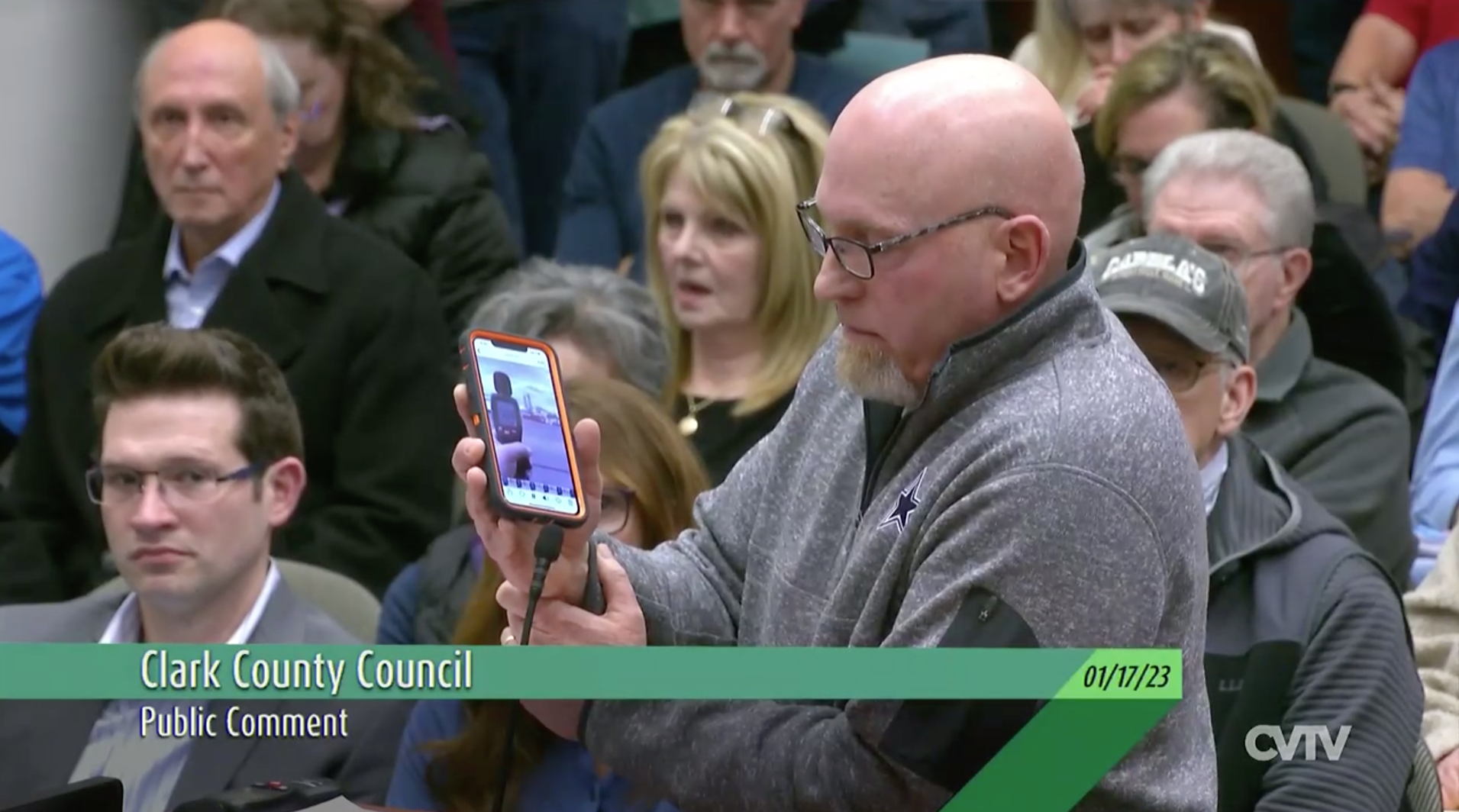 Mark Krant plays recorded audio of a light cement plant at the Port of Vancouver for the Clark County Council on Tuesday night. Residents packed council chambers Tuesday night to protest a cement plant that has been proposed north of 179th Avenue and east of the Meadow Glade area.