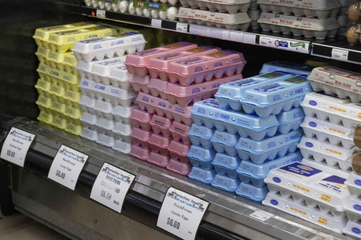 FILE - Cartons of eggs are on display at HarvesTime Foods on Thursday, Jan. 5, 2023, in Chicago. U.S. Sen. Jack Reed sent a letter Tuesday, Jan. 24, asking for the Federal Trade Commission to investigate whether egg prices have been improperly manipulated by producers.
