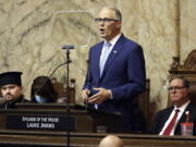 Washington Gov. Jay Inslee delivers his 2023 State of the State address at the Capitol in Olympia on Jan. 10. Inslee took the rare step of testifying at a Senate committee meeting Tuesday to show his support for a proposed state constitutional amendment protecting the right to abortion in Washington.