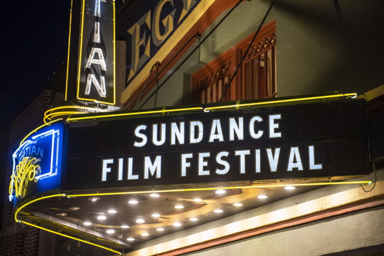FILE - The marquee of the Egyptian Theatre appears during the Sundance Film Festival in Park City, Utah on Jan. 28, 2020. After two years of virtual editions, the Sundance Film Festival is returning to Park City, Utah armed with a robust slate of diverse features and documentaries that will premiere over 10 days beginning on Thursday, Jan. 19.