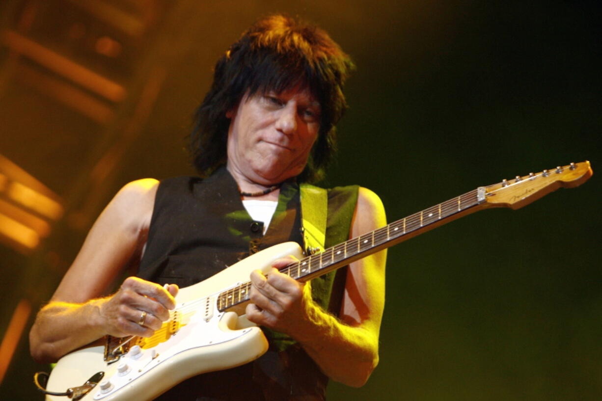 FILE -  British guitarist Jeff Beck performs on the Stravinski hall during the 41st Montreux Jazz Festival in Montreux, Switzerland, late Sunday, July 15, 2007. Beck, a guitar virtuoso who pushed the boundaries of blues, jazz and rock 'n' roll, influencing generations of shredders along the way and becoming known as the guitar player's guitar player, died Tuesday, Jan. 10, 2023, after "suddenly contracting bacterial meningitis," his representatives said in a statement released Wednesday. He was 78.