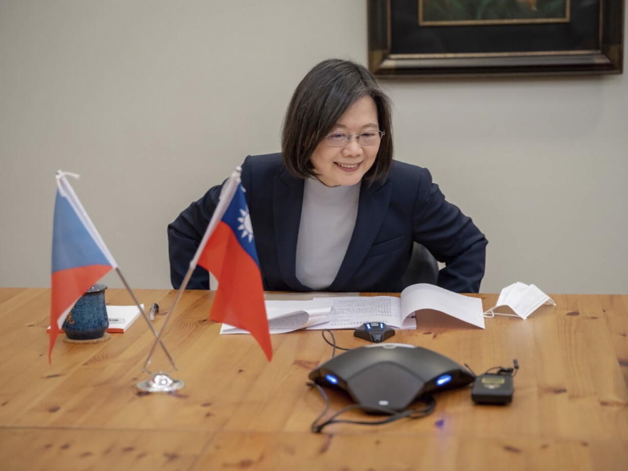 In this photo released by the Taiwan Presidential Office, Taiwan's President Tsai Ing-wen speaks by phone with the Czech Republic's President elect Petr Pavel in Taipei, Taiwan, Monday, Jan. 30, 2023. China on Tuesday, Jan. 31, 2023, accused Czech President-elect Petr Pavel of challenging its hard line on national sovereignty by affirming ties with self-ruled Taiwan in a phone with the island's leader.