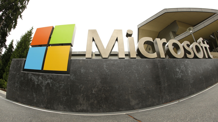 FILE - This July 3, 2014, file photo, shows the Microsoft Corp. logo outside the Microsoft Visitor Center in Redmond, Wash. In just the past month of Jan. 2023, there have been nearly 50,000 job cuts across the technology sector. Large and small tech companies went on a hiring spree in over the past several years due to a demand for their products, software and services surged with millions of people working remotely.
