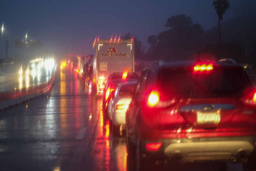 FILE - Traffic is seen as the U.S. Freeway 101 is closed near Montecito, Calif., on Jan. 9, 2023. Traffic crashes in the U.S. cost society $340 billion in one year, or just over $1,000 for each of the country's 328 million people, according to a study by safety regulators Tuesday, Jan. 10. (AP Photo/Ringo H.W.