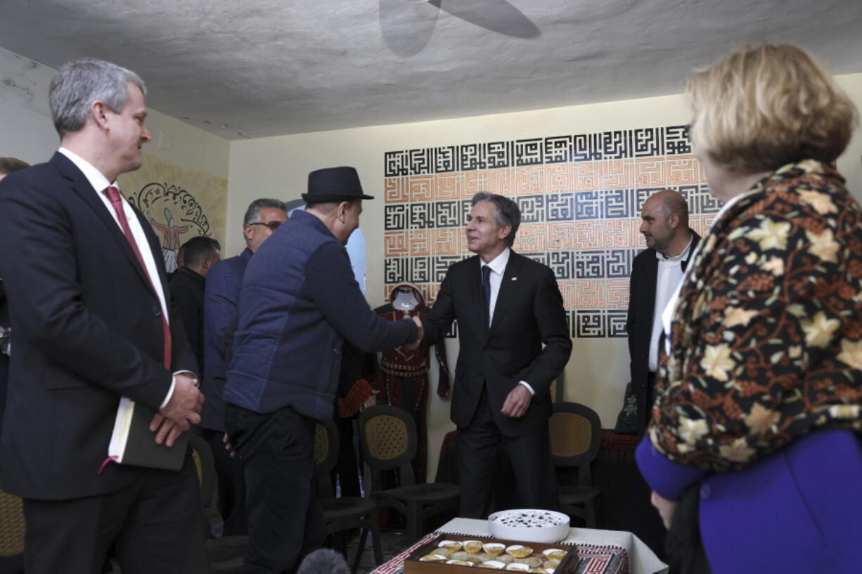 U.S. Secretary of State Antony Blinken, center, meets representatives of the Palestinian civil society in Ramallah in the occupied West Bank, on Tuesday, Jan. 31, 2023. Blinken is wrapping up a two-day visit to Israel and the West Bank with renewed appeals for Israeli-Palestinian calm amid an alarming spike of violence.