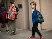 Orion Muller waves goodbye to his mother on Wednesday, Sept. 14, 2022, his first day of kindergarten at Greenwood Elementary. Washington is the only state that doesn't require kids to start school until age 8.