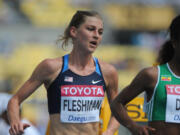 Lauren Fleshman runs during the women's 5,000M heats at the International Association of Athletics Federations World Championships in Daegu on Aug. 30, 2011.