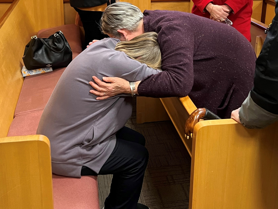 Norma Countryman Lewis, left, and Mollie Morrison embrace after the guilty verdict is read in Warren Forrest's 1974 cold-case murder trial.