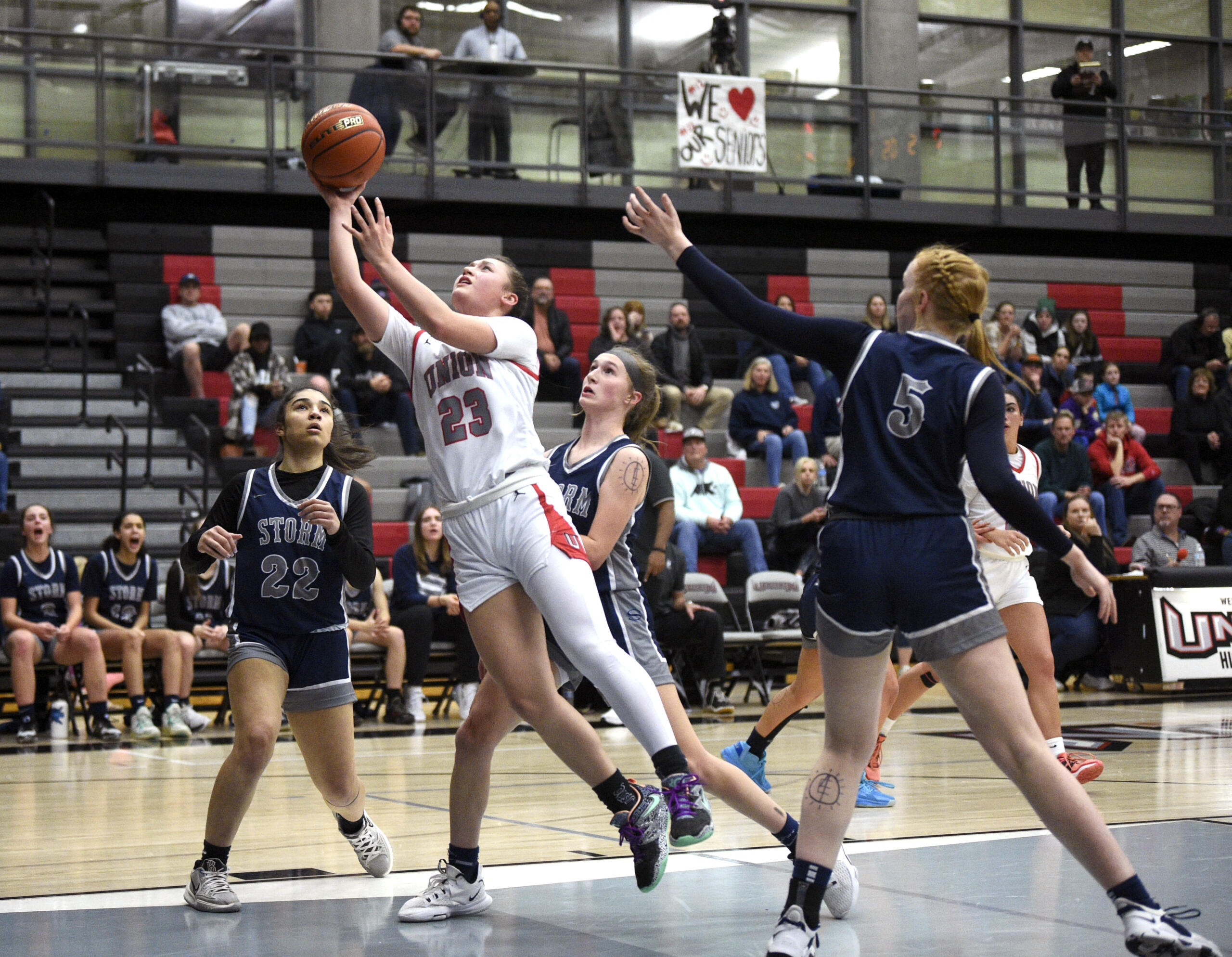 Union’s Brooklynn Haywood goes up for a shot in the paint between multiple Skyview defenders on Tuesday, Feb. 7, 2023, at Union High School.