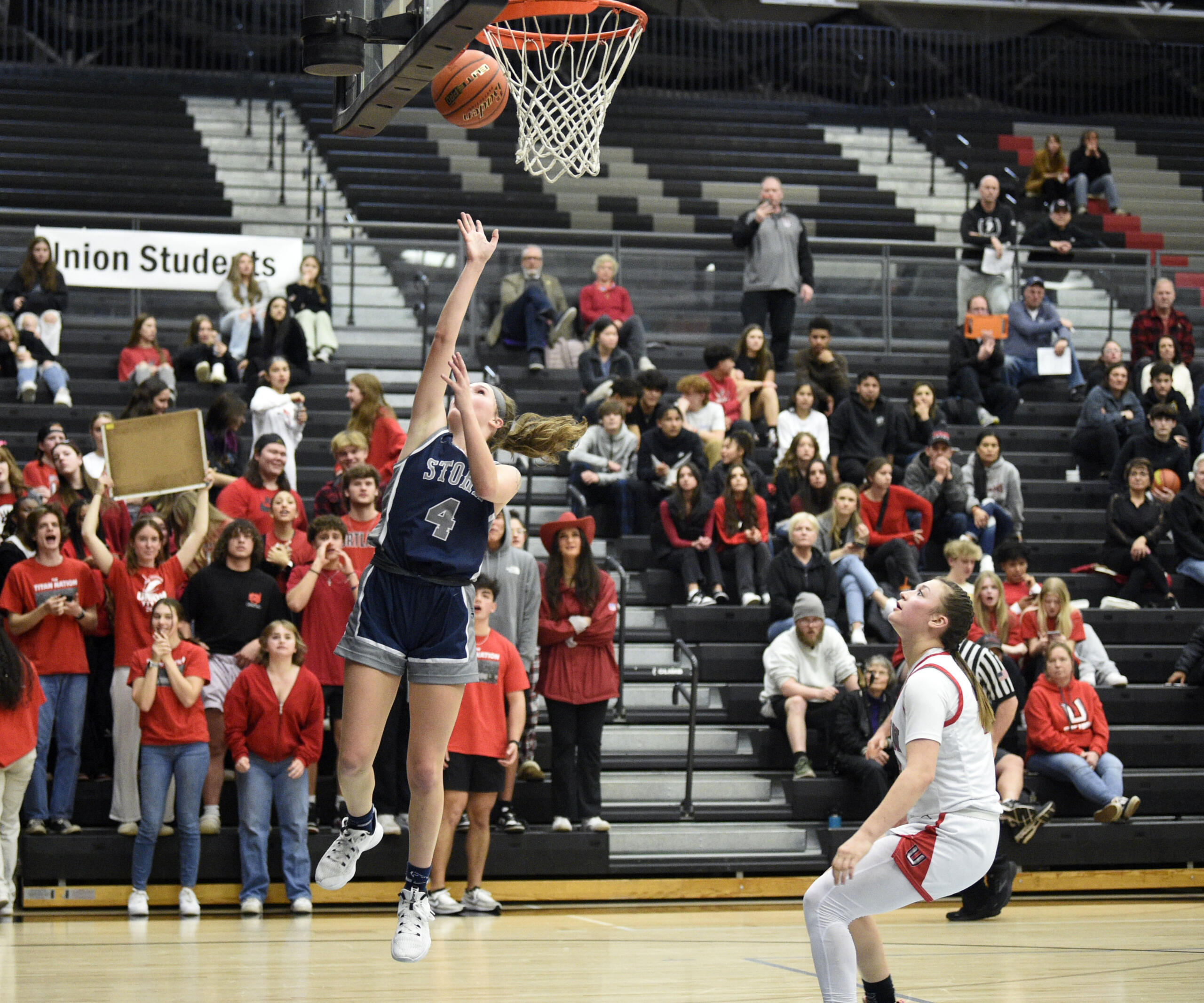Skyview’s Sam Groesbeck, left, puts in a layup following a steal in the open court against Union on Tuesday, Feb. 7, 2023, at Union High School.