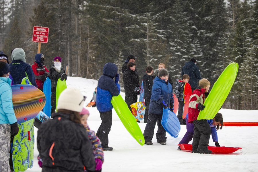 The sledding hill at Hyak Sno-Park is full of kids with bright plastic sleds.Public snow access areas at Snoqualmie Pass are full and overflowing on weekends, creating headaches and hazards alike.