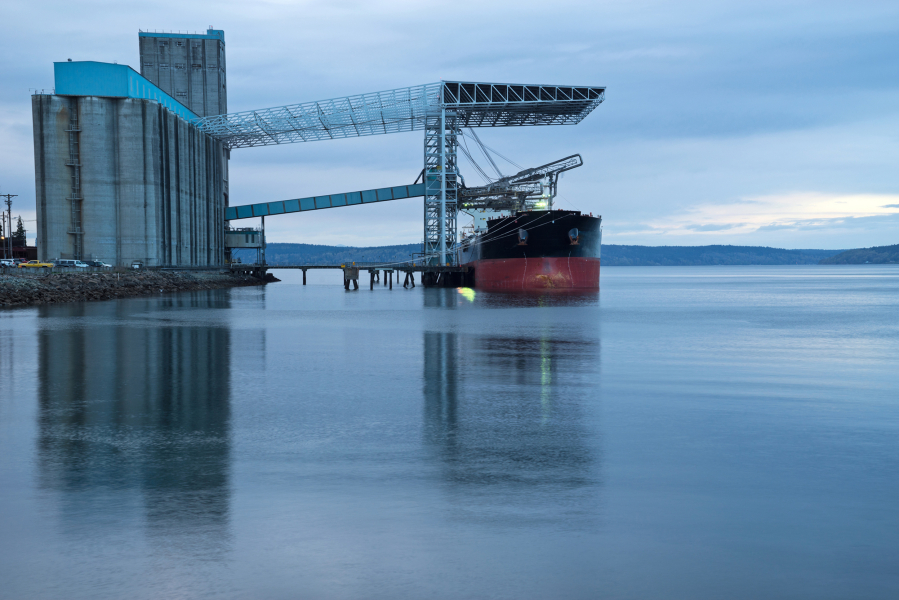 A ship is loaded at a grain terminal in Tacoma, Washington.