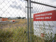 Fencing surrounds the future location of an Amazon warehouse on Friday, July 8, 2022, in northeast Vancouver.