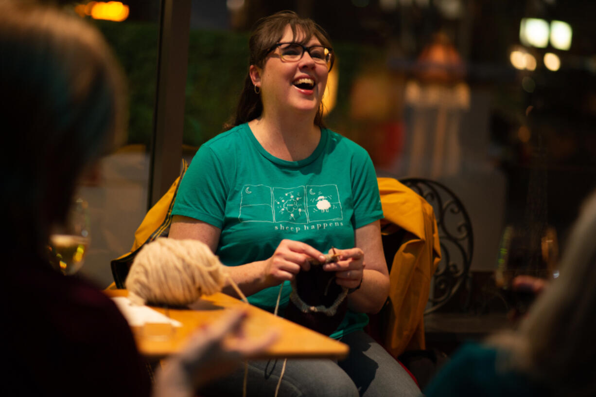 Jen Langdon laughs and knits while drinking riesling at Niche Wine Bar in downtown Vancouver. Bars are offering activities not usually associated with drinking establishments to lure customers, especially midweek.
