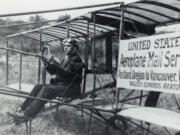 A former banker turned daredevil pilot, Walter Edwards Kittel, sits in the airplane Silas Christofferson flew off a Portland hotel. He flew as Walter Edwards throughout the Pacific Northwest. In 1912, he carried the first batch of airmail between Portland and Vancouver in this airplane making the first interstate airmail delivery in the United States.