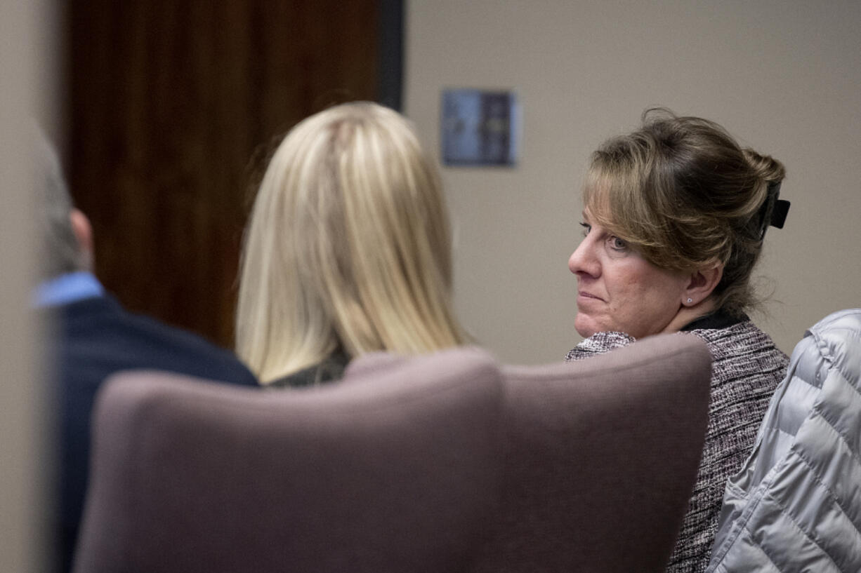 Stephanie "Sam" Westby, right, is seated next to her attorneys during the opening of her murder trial Monday morning at the Clark County Courthouse. She's accused of killing her husband during a confrontation over him having an affair.
