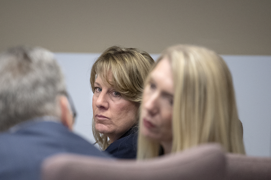 Stephanie "Sam" Westby, left facing, sits with defense attorney Jacy Thayer during closing arguments in Westby's murder trial Thursday morning in Clark County Superior Court. Westby was accused of killing her husband during a confrontation over him having an affair. She was acquitted of all charges Thursday afternoon.