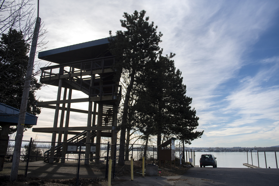 Visitors climb three flights of stairs to the top of the Henry J. Kaiser Memorial Shipyard Memorial tower, alongside the Columbia River in Vancouver's Marine Park.