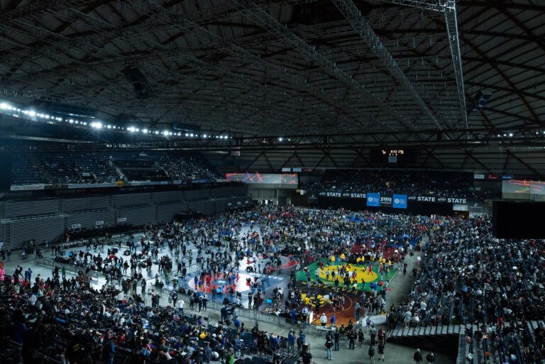 Wrestlers warm up before the start of Mat Classic XXXIV on Friday, February 17, 2023, at the Tacoma Dome.