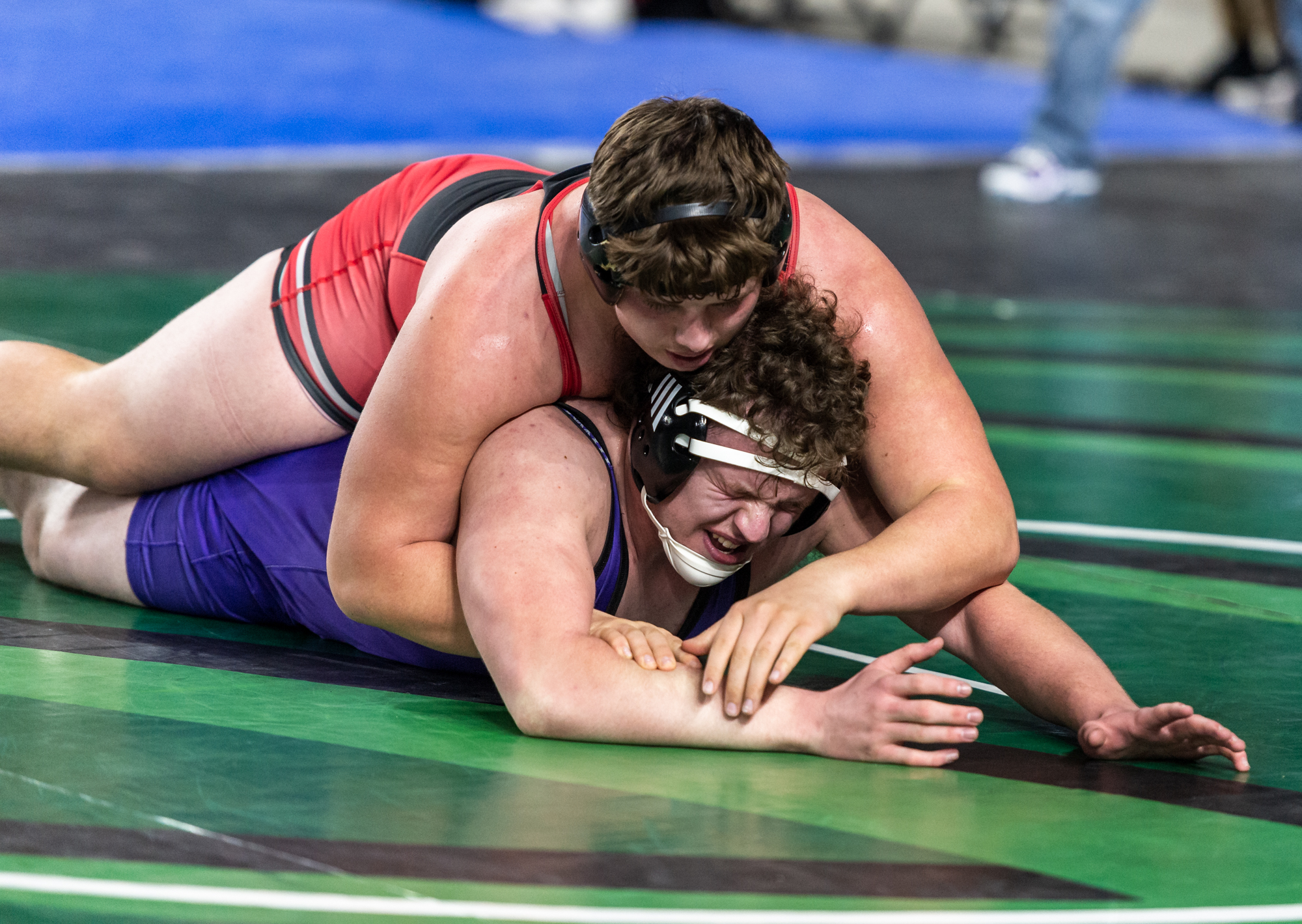 Yelm’s Jonah Smith, 285 pounds, competes against Heritage’s Austin Steinbach in the semifinals at Mat Classic XXXIV on Saturday, February 18, 2023, at the Tacoma Dome.