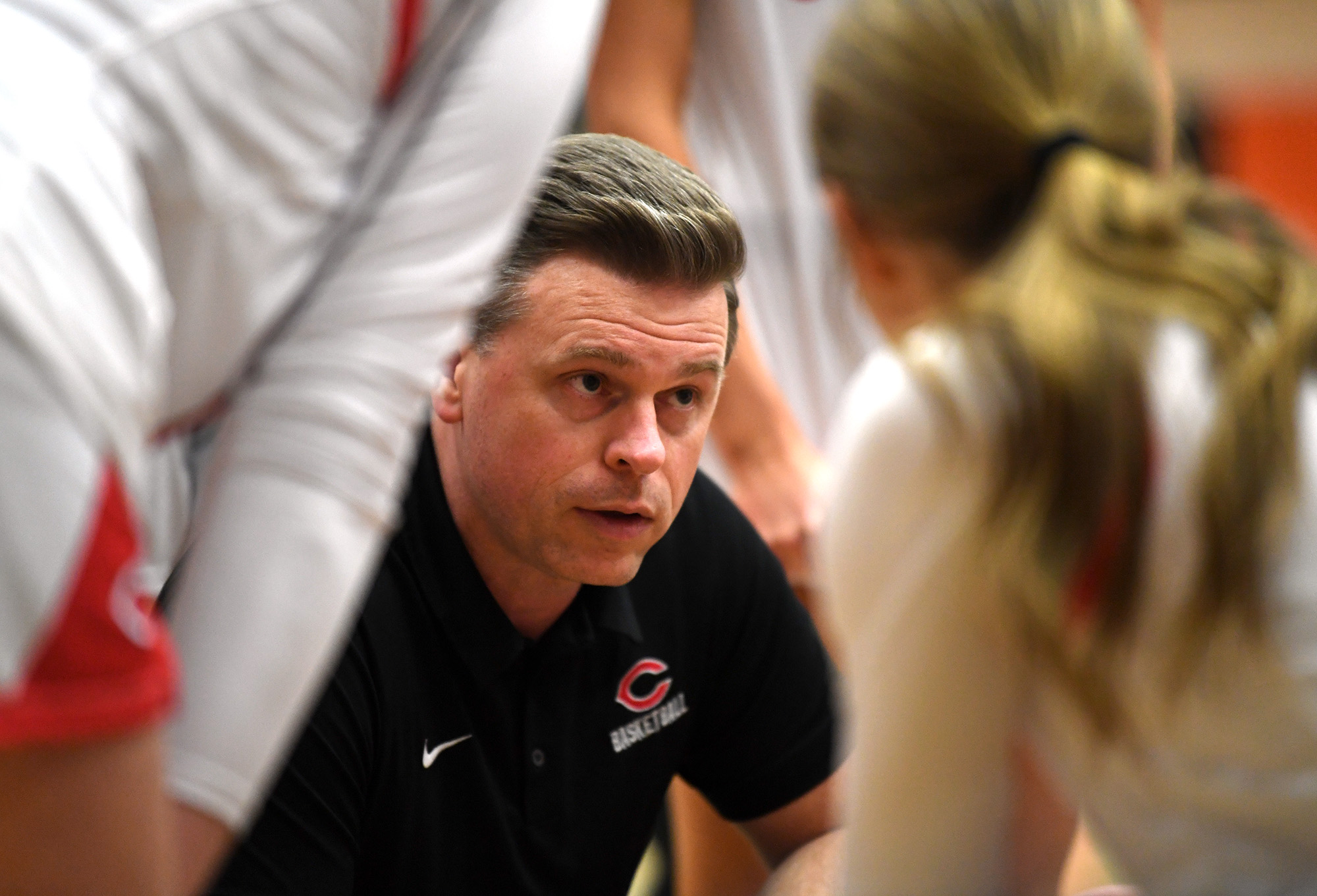 Camas head girls basketball coach Scott Thompson talks to the team Friday, Feb. 24, 2023, during the Papermakers’ 52-48 win against Kamiakin at Battle Ground High School.