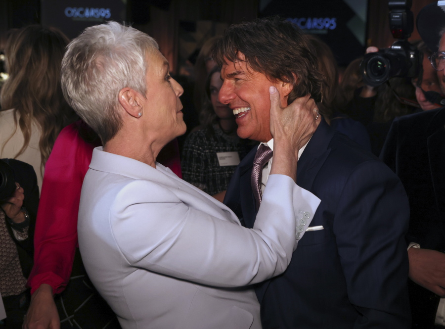 Jamie Lee Curtis, left, and Tom Cruise attend the 95th Academy Awards Nominees Luncheon on Monday, Feb. 13, 2023, at the Beverly Hilton Hotel in Beverly Hills, Calif.