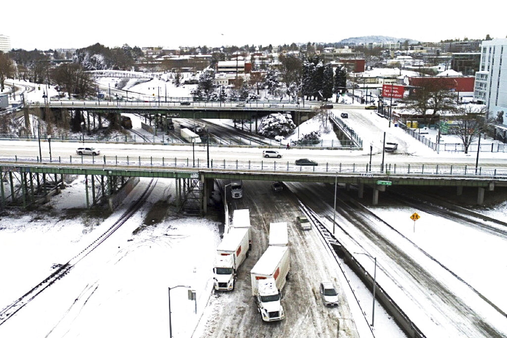 The area where Interstate 5 and I-84 meet up is covered in snow on Thrusday, Feb. 23,2023 in Portland, Ore. Portland received nearly a foot of snow Wednesday.