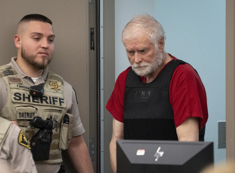 George Alan Kelly enters court for his preliminary hearing in Nogales Justice Court in Nogales, Ariz., Wednesday, Feb. 22, 2023. Kelly, faces a first-degree murder charge in the fatal shooting of Gabriel Cuen-Butimea, who lived just south of the border in Nogales, Mexico.