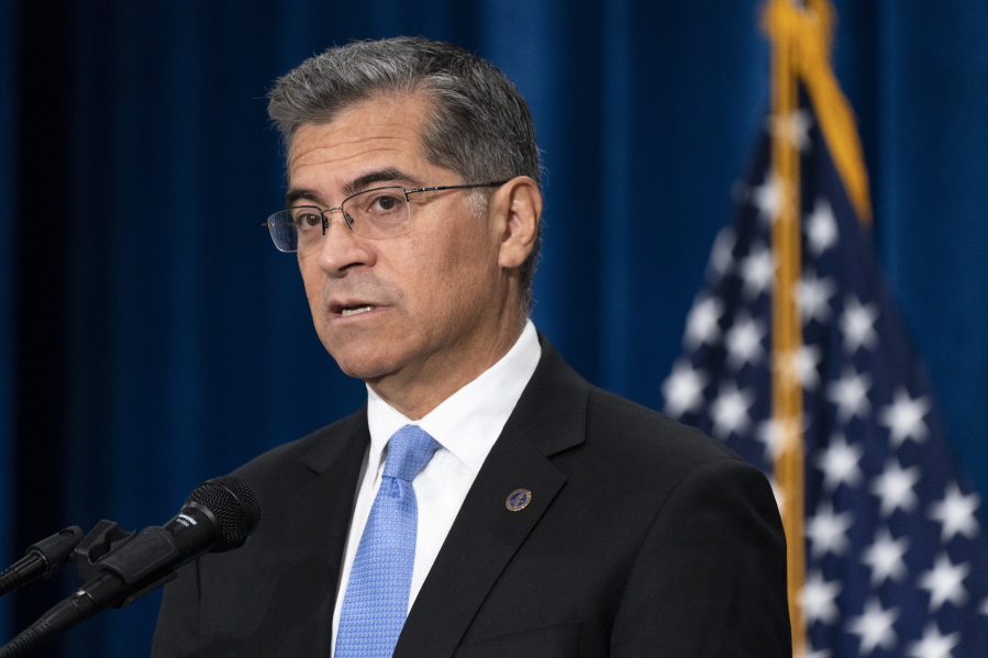 FILE - Health and Human Services Secretary Xavier Becerra speaks during a news conference at the HHS Humphrey Building, Oct. 18, 2022, in Washington. The Biden administration said Monday, Feb. 27, 2023, that it is creating a new task force to crack down on an explosion of migrant children in the U.S. who are being illegally exploited for labor.