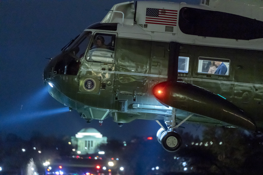 Marine One, with President Joe Biden in the window, approaches for landing on the South Lawn of the White House, Thursday, Feb. 9, 2023, in Washington. Biden is returning from Florida.