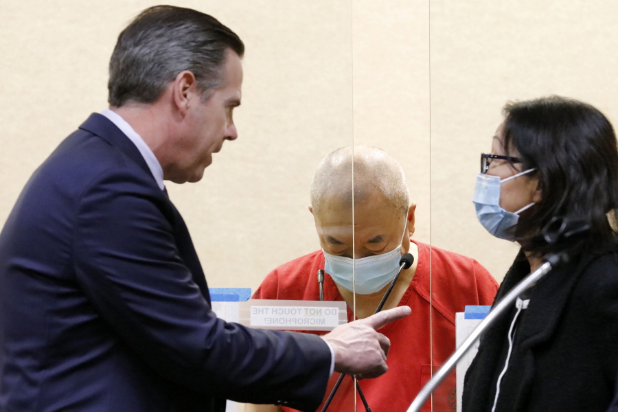 Chunli Zhao, center, appears for a plea hearing with his defense attorney Eric Hove, left, at San Mateo Superior Court in Redwood City, Calif., Thursday, Feb. 16, 2023. Zhao, a farmworker charged with killing seven people last month in back-to-back shootings at two Northern California mushroom farms, pleaded not guilty on Thursday to seven counts of murder and one count of attempted murder. (David G.