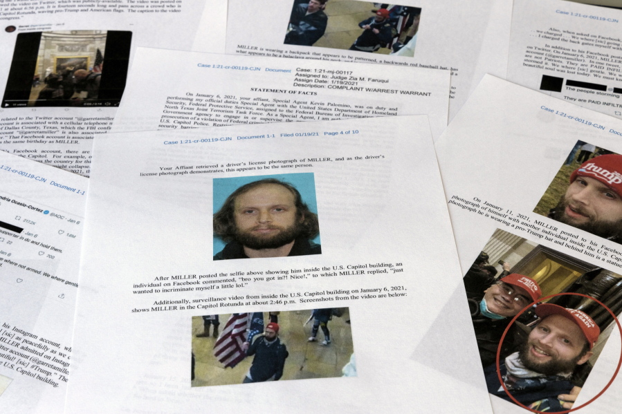 FILE - A statement of facts document presented to the United States District Court in the case against Garret Miller is photographed, March 29, 2021.