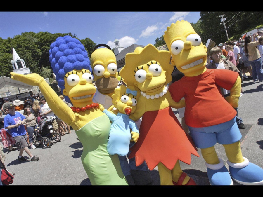 Characters from The Simpsons pose before the premiere of "The Simpsons Movie", Springfield, Vermont, July 21, 2007. Walt Disney Co. has been recently removed an episode from cartoon series The Simpsons that included a reference to "forced labor camps" in China from its streaming service in Hong Kong.