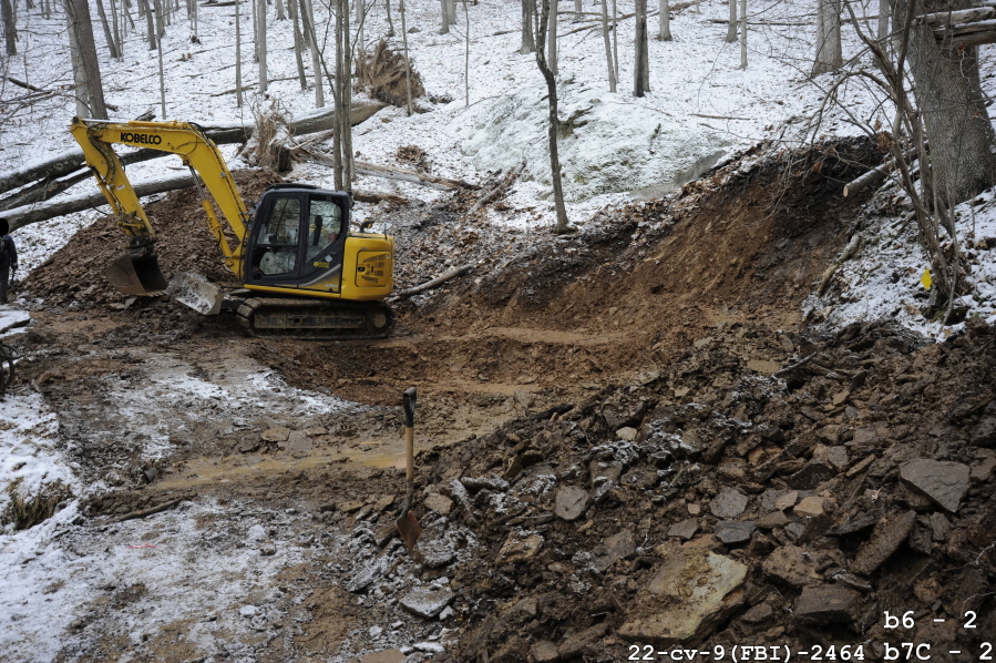 This 2018 photo shows the FBI's dig for Civil War-era gold at a remote site in Dents Run, Pa. The government says the dig came up empty.