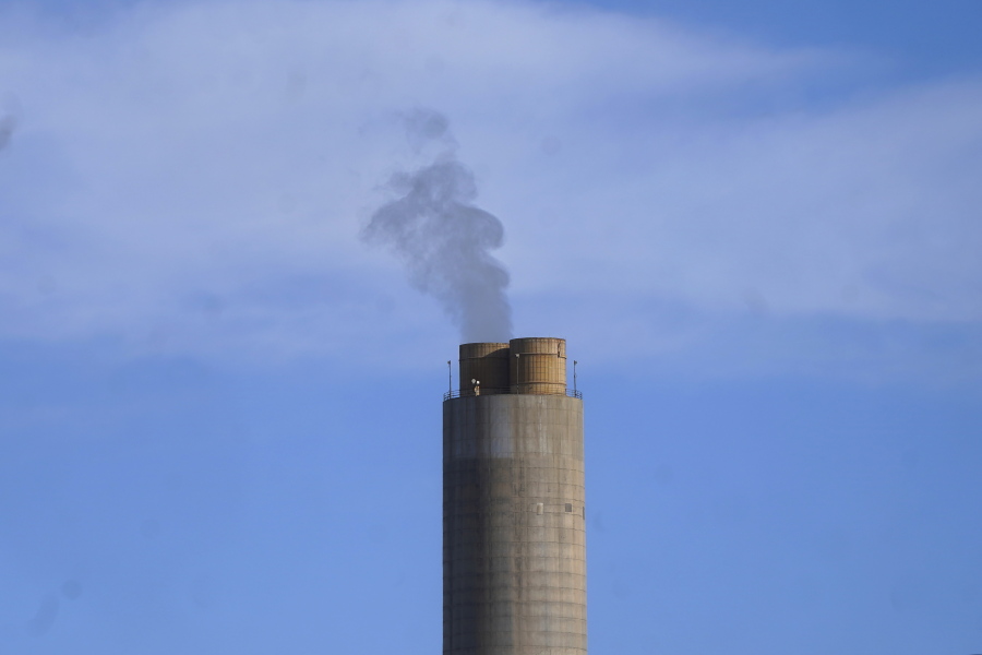 FILE - A smokestack stands at a coal plant on June 22, 2022, in Delta, Utah. The U.S. Environmental Protection Agency on Friday, Feb. 17, 2023, reaffirmed the basis for a rule that requires "significant reductions" in mercury and other harmful pollutants from power plants, reversing a move late in former President Donald Trump's administration to roll back emissions standards.
