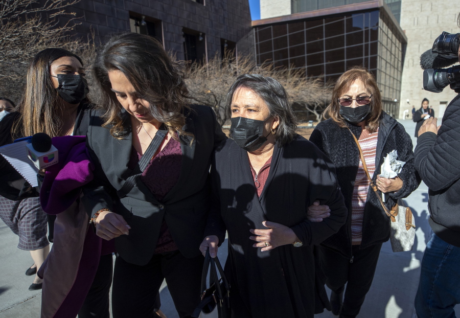 Relatives of victims of the August 2019 Walmart mass shooting, who declined to speak to the media, leave the federal court in El Paso, Texas, Wednesday, Feb. 8, 2023. Defendant Patrick Crusius pleaded guilty to federal charges accusing him of killing 23 people in the racist attack, changing his plea weeks after the U.S. government said it wouldn't seek the death penalty for the hate crimes and firearms violations.