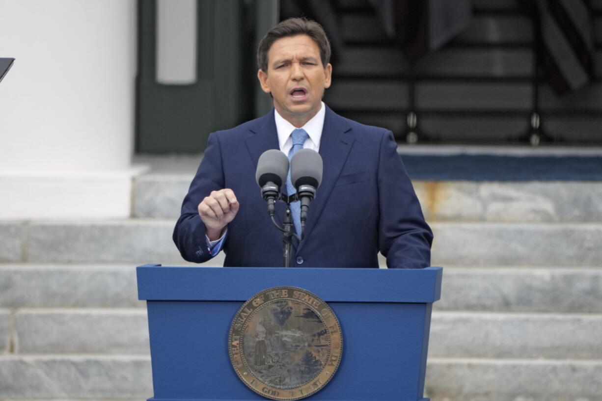 FILE - Florida Gov. Ron DeSantis speaks after being sworn in to begin his second term during an inauguration ceremony outside the Old Capitol Jan. 3, 2023, in Tallahassee, Fla. DeSantis may be months away from publicly declaring his presidential intentions, but his potential rivals aren't holding back. A half dozen high-profile Republican White House prospects have begun courting top political operatives in states like New Hampshire and Iowa.