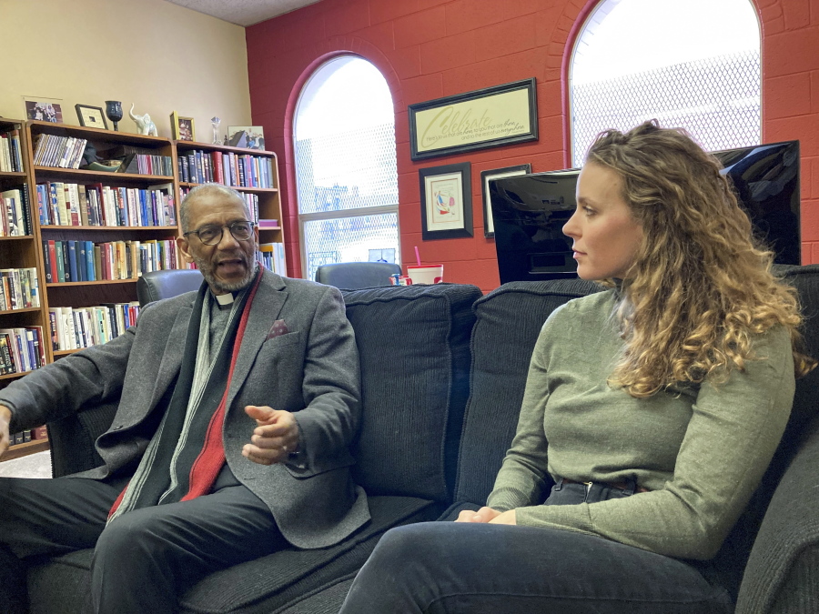 The Rev. Darryl Gray, left, and the Rev. Lauren Bennett speak Jan. 10 in Bennett's office in St. Louis, Mo. Both served as spiritual advisers at recent executions in Missouri, sitting alongside the inmates and touching them as the process occurred. Spiritual advisers have been increasingly present during executions since a Supreme Court ruling last year.