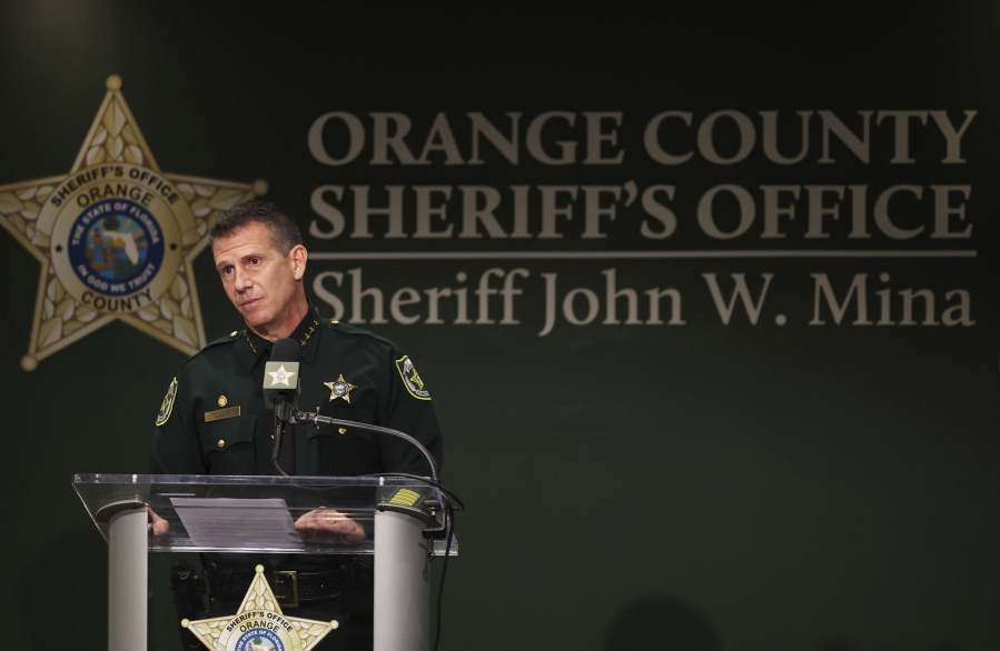 Orange County Sheriff John Mina addresses the media during a press conference about multiple shootings, Wednesday, Feb. 22, 2023, in Orlando, Fla. A central Florida television journalist and a little girl were fatally shot Wednesday afternoon near the scene of a fatal shooting from earlier in the day, authorities said. Mina said that they've detained Keith Melvin Moses, 19, who they believe is responsible for both shootings in the Orlando-area neighborhood.