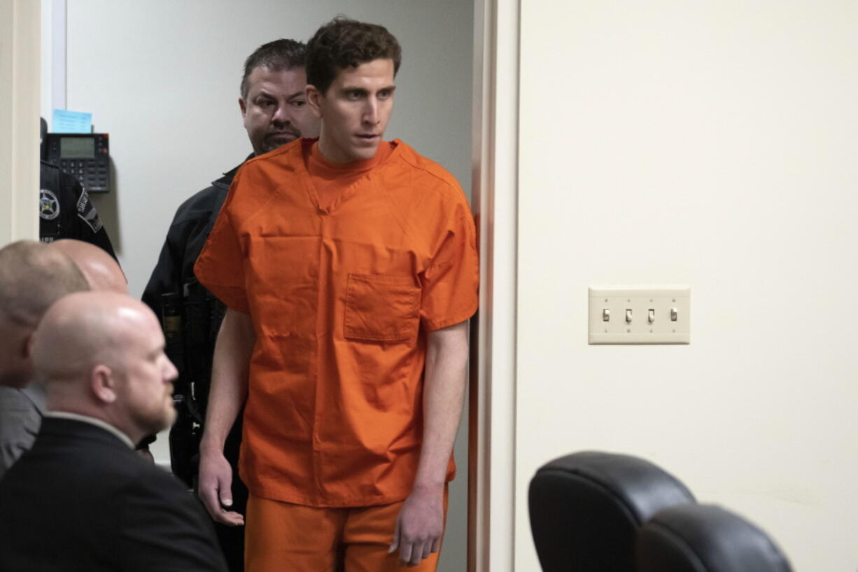 FILE - Bryan Kohberger, who is accused of killing four University of Idaho students in Nov. 2022, appears at a hearing in Latah County District Court, on Jan. 5, 2023, in Moscow, Idaho. Thirty news organizations have asked the Idaho Supreme Court to overturn a sweeping gag order in a case against Kohberger who is accused of stabbing the four students to death. (AP Photo/Ted S.